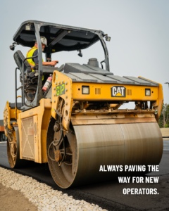 An image of a yellow dozer with text in the bottom right corner saying: Always paving the way for new operators.