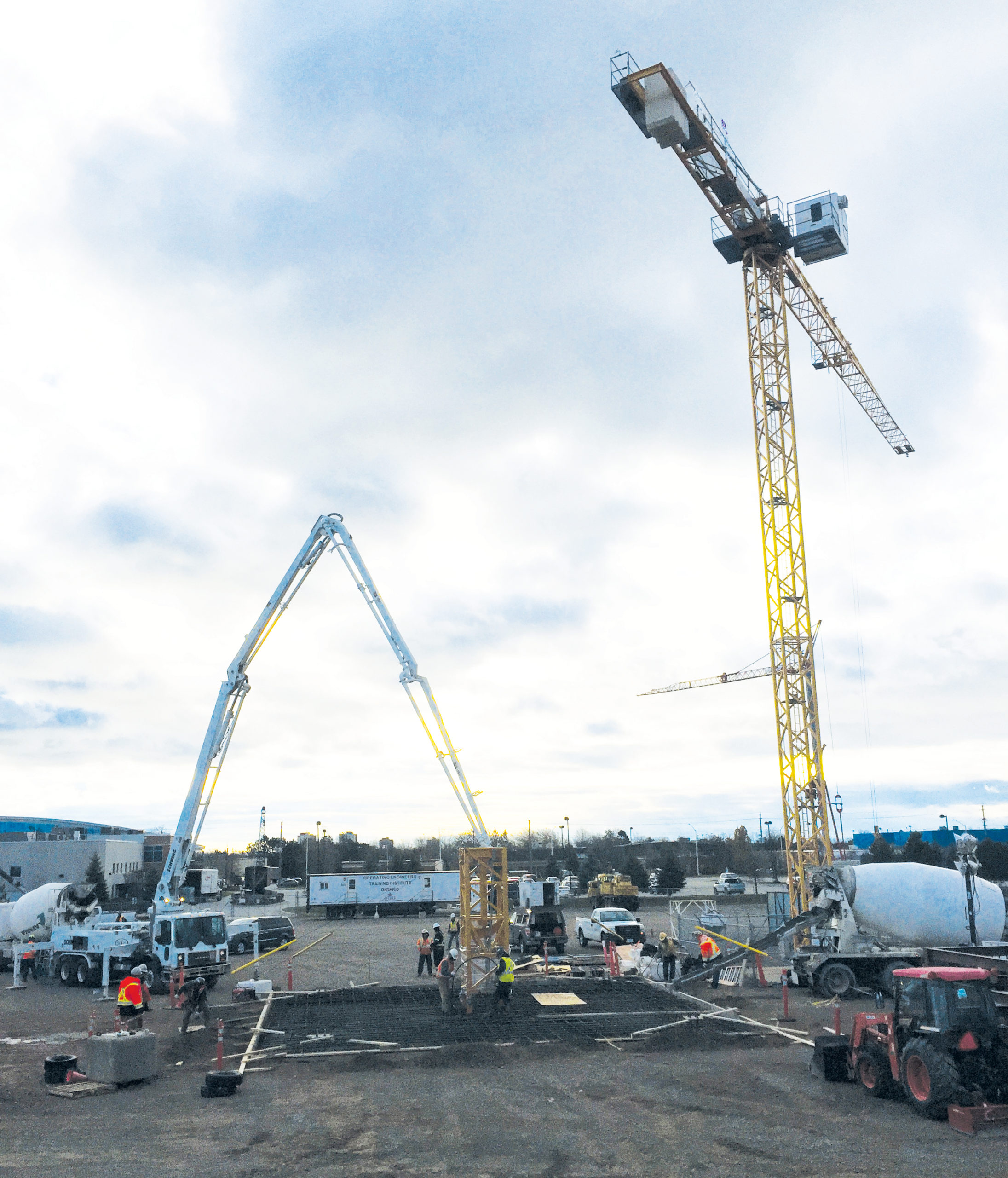 Concrete is poured for the new tower crane by member Craig Agar.