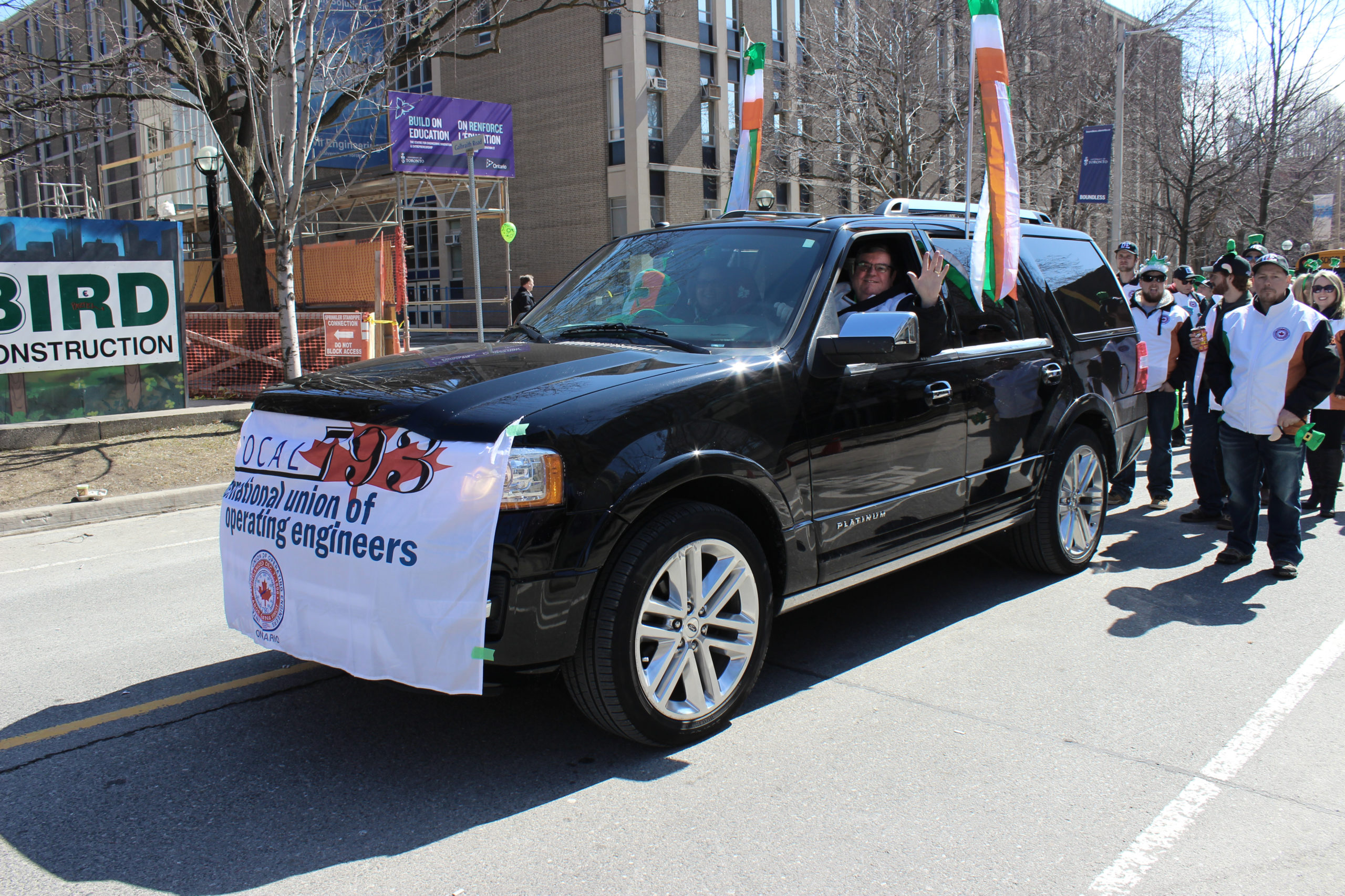 Local 793 Business manager Mike Gallagher waves to onlookers.