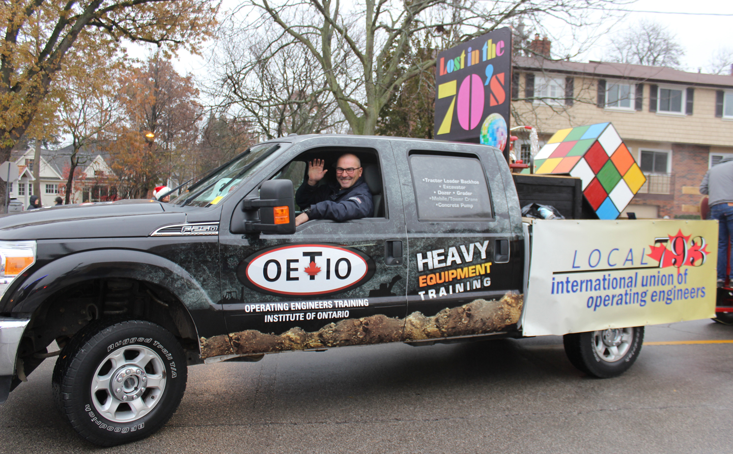 The OETIO truck leads the way as Local 793 members, staff and their families take part in the Santa Claus Parade.