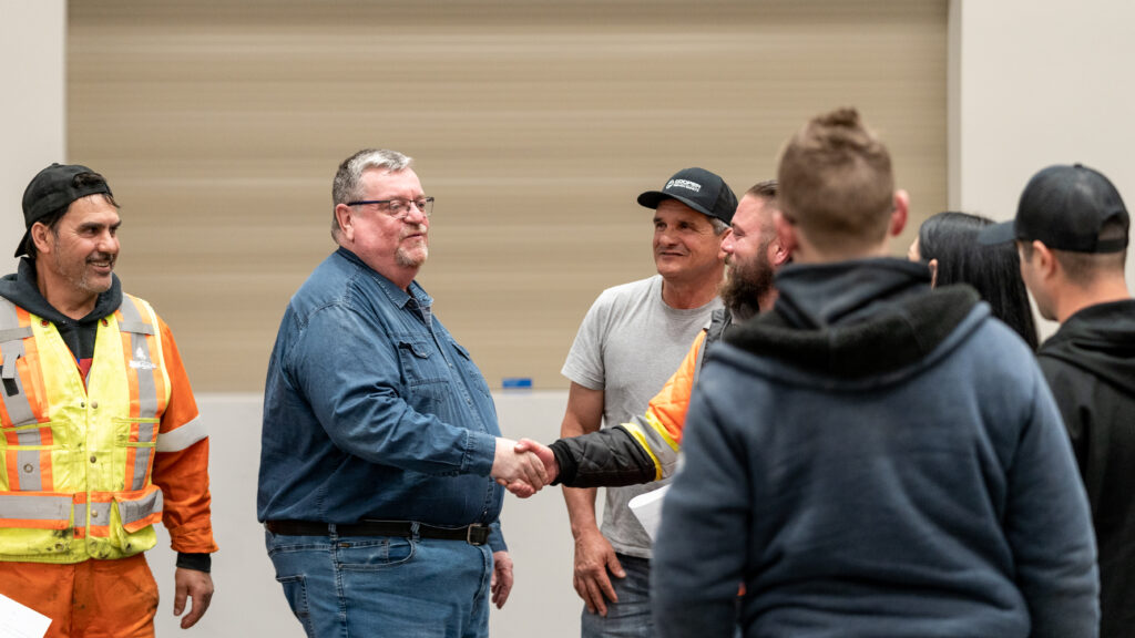 Business Manager, Mike Gallagher shaking hands and meeting with Local 793 members