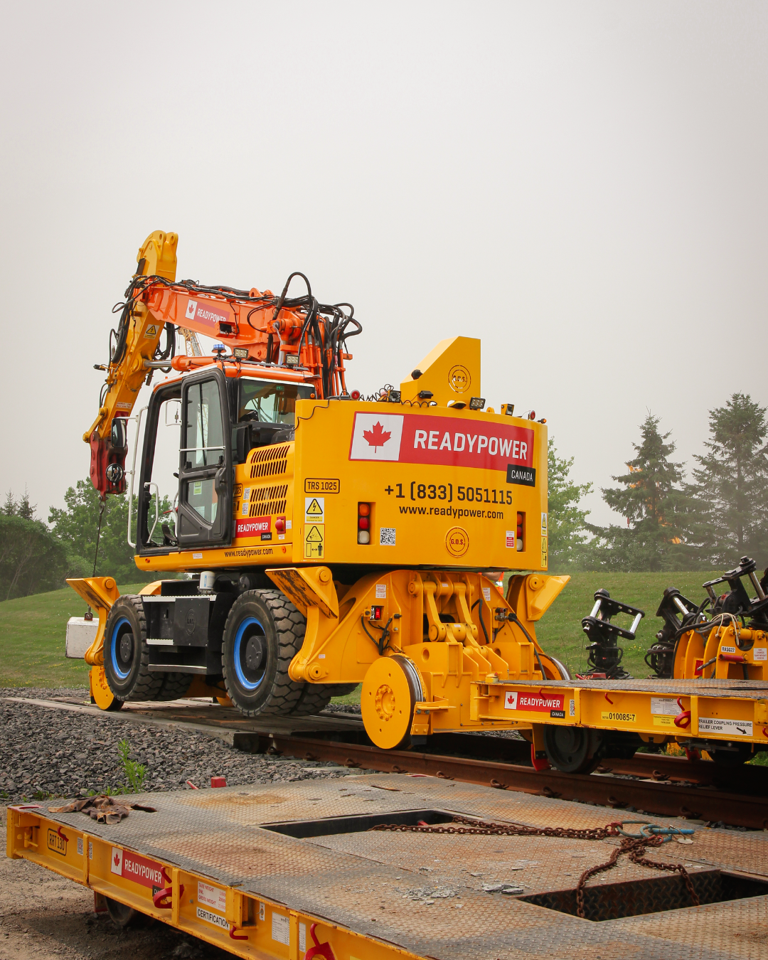 A High Rail Excavator on train tracks