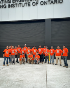 Oro-Medonte OETIO apprentices and staff wearing orange shirts