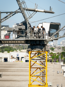 DRPS Tactical Support Unit standing on of a crane platform