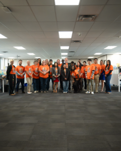 OEBAC Staff wearing orange shirts
