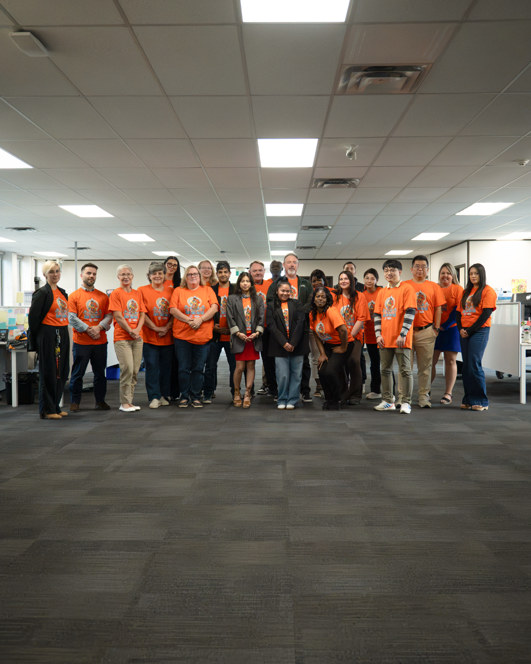 OEBAC Staff wearing orange shirts