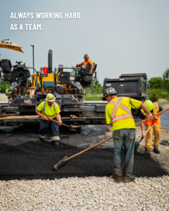 4 construction workers paving a road. Text in the top left corner of the image reads: Always working hard, as a team.