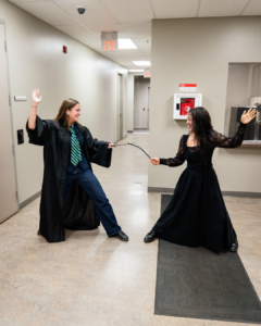 793 and OETIO staff members dressed as Bellatrix Lestrange and a Slytherin Student