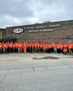 Morrisburg 793 and OETIO staff and apprentices wearing orange shirts