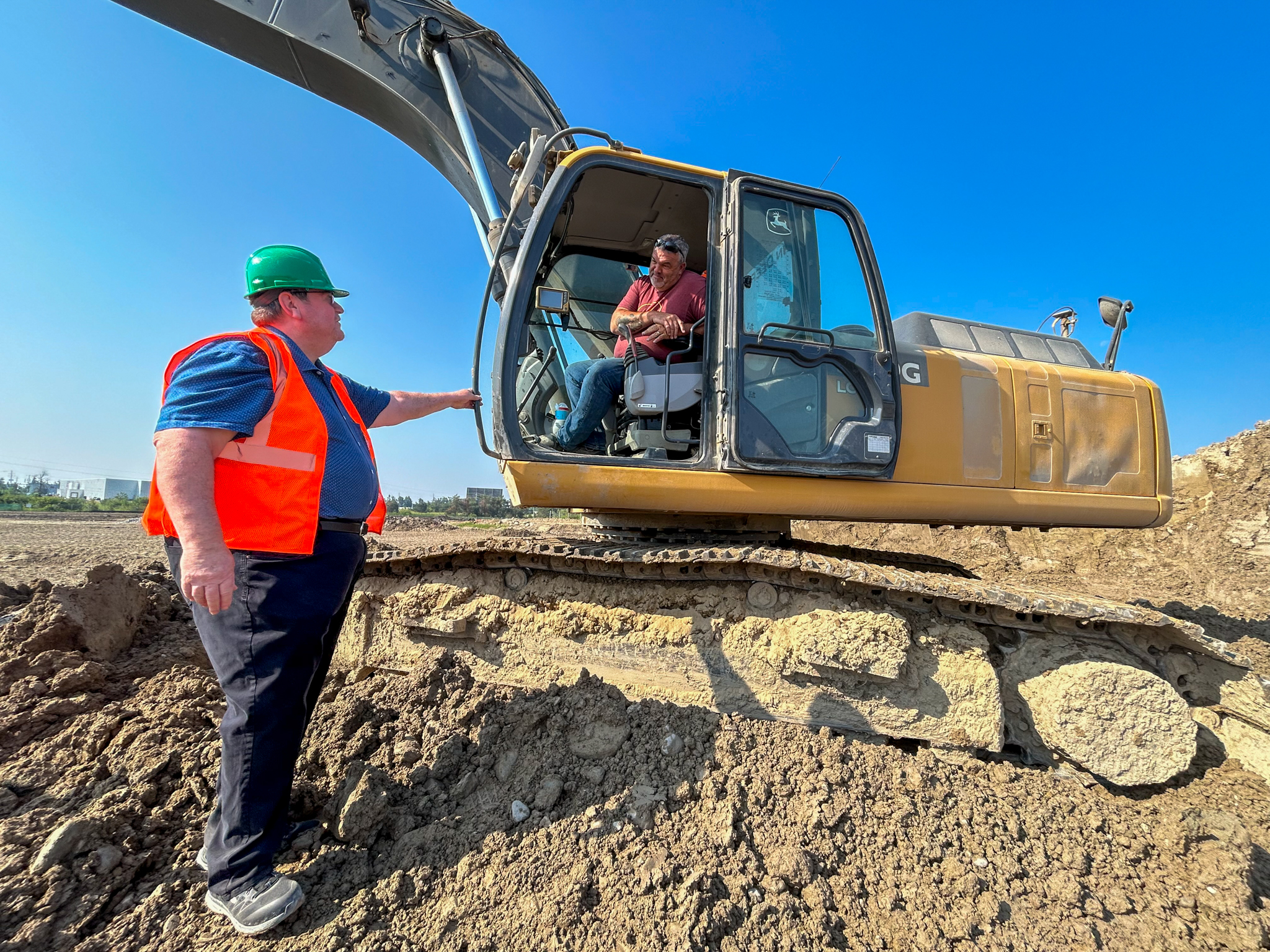 Business Manager Gallagher with Brent MacDonald.