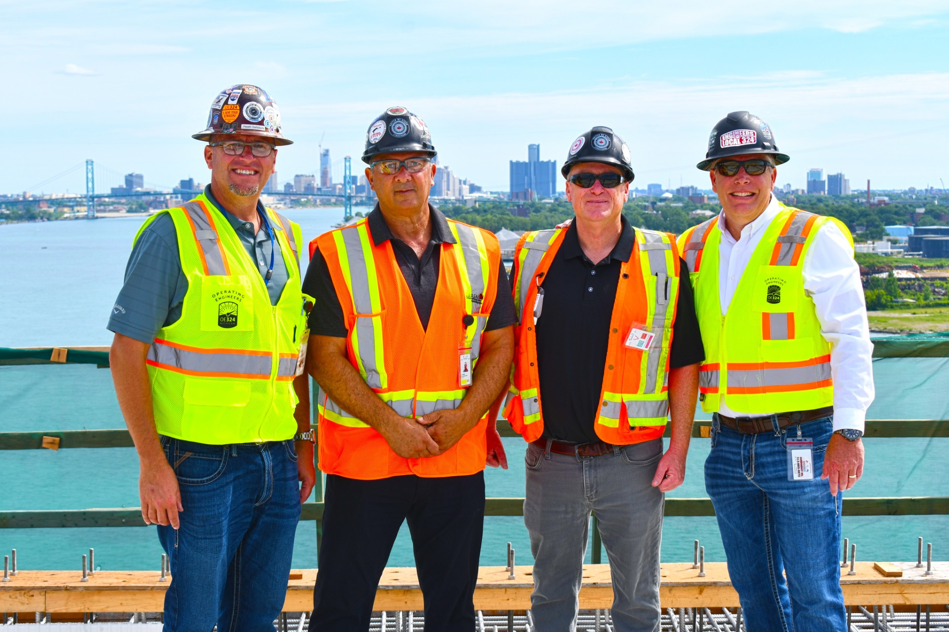 OEs Meet at Centre of Gordie Howe Int’l Bridge for Ceremonial Handshake