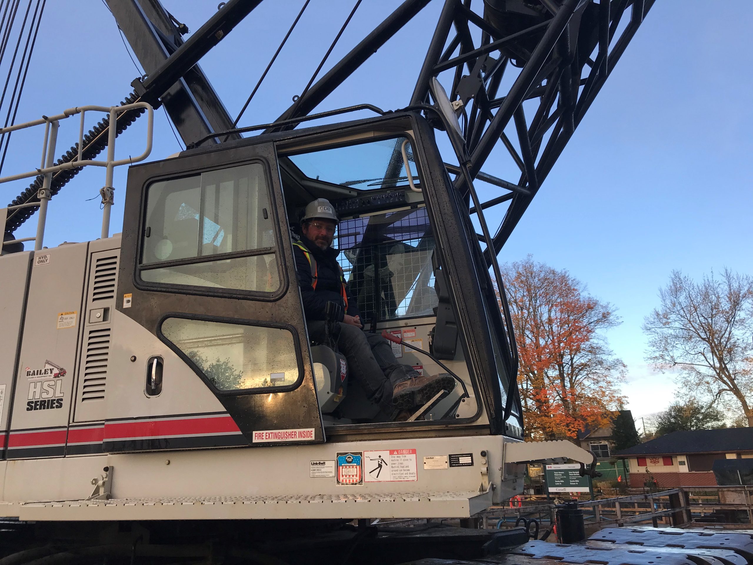 Michael Deasy is operating a LinkBelt 238 crawler crane.