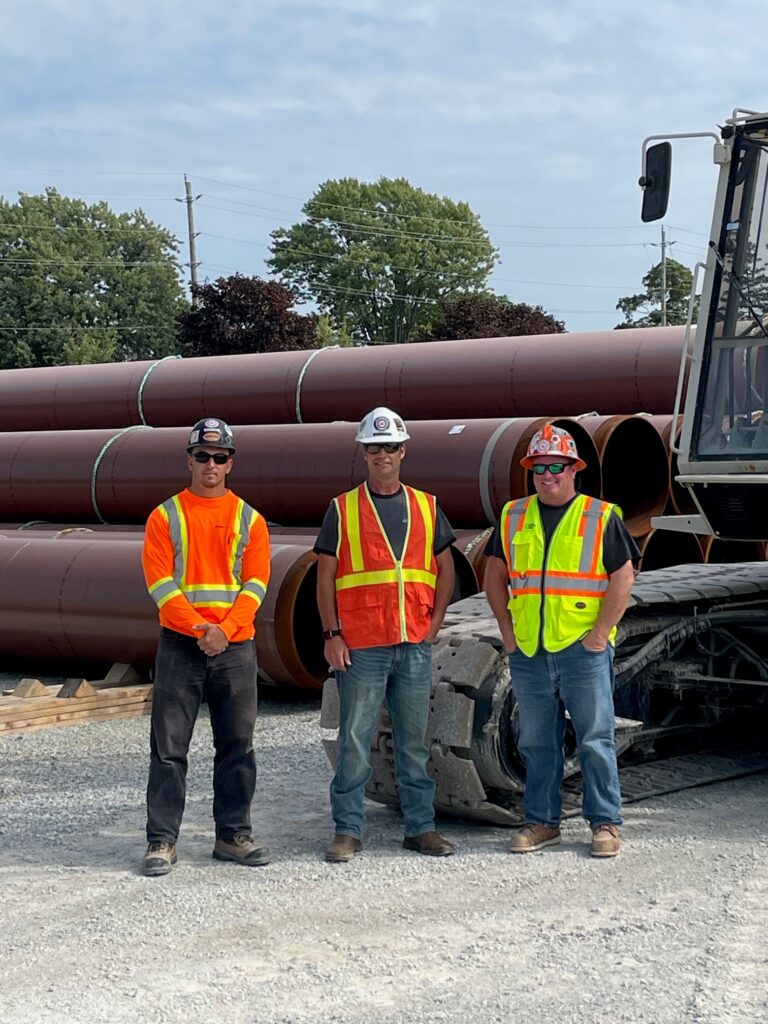 (L to R) Alex O’Neil (crane apprentice), Paul Knight (Local 793 pipeline rep), and Andrew Barrie (crane operator)
