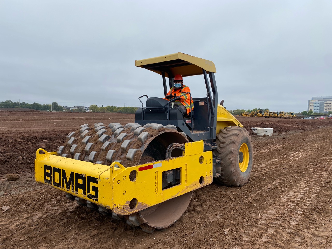 Patrick Doussept operating a Bomag sheep’s foot packer