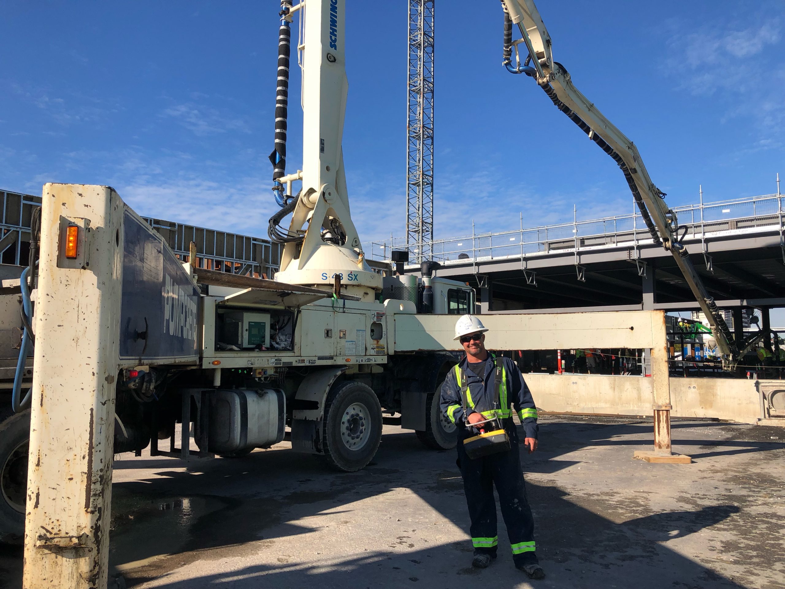 Harley Moco is operating a Schwing S-48 SX concrete pump.